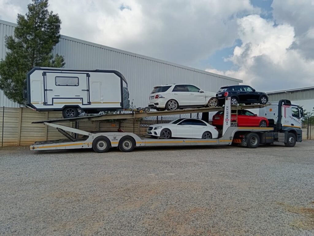 Caravans, trailers, boats, cars, race cars, vintage cars, luxury cars....we transport all vehicles with the lowest prices in the auto transport industry